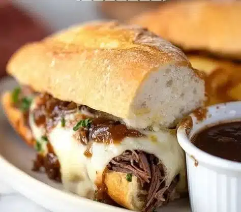 Crock Pot French Dip Sandwiches with juicy beef and rich dipping sauce