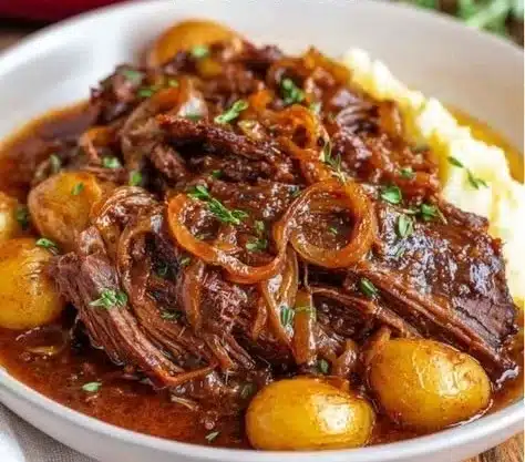 French Onion Pot Roast 5 Delicious French Onion Pot Roast served with caramelized onions and melted cheese.