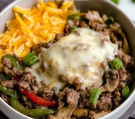 Philly Cheesesteak Bowl with juicy steak, peppers, and cheese presentation