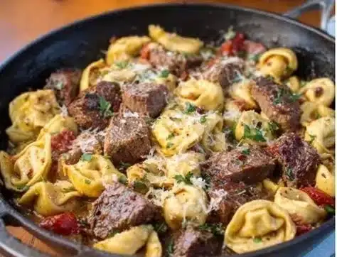 Delicious Garlic Steak Tortellini dish with grilled steak and pasta