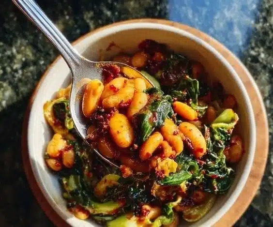 Delicious Gochujang Butter Beans served with Escarole, a healthy meal option.