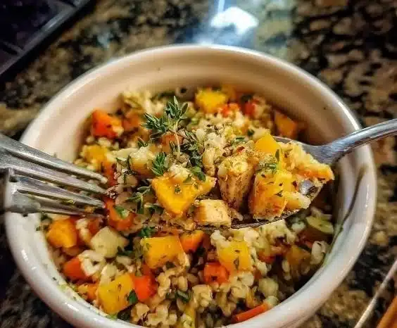 Lemon Thyme Grain Bowl Vinaigrette drizzled over a colorful grain bowl