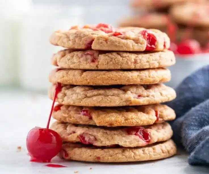 Delicious cherry almond cookies on a plate, showcasing their soft texture and sweetness.