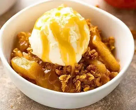 Easy Apple Crisp 2 Delicious easy apple crisp dessert with golden brown topping and tender apple filling