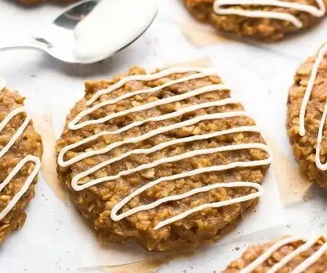 Homemade Gingerbread Oatmeal Cookies decorated with festive spices and oats