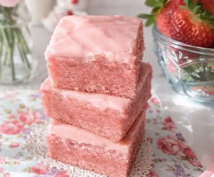 Delicious strawberry brownies topped with fresh strawberries for Valentine's Day