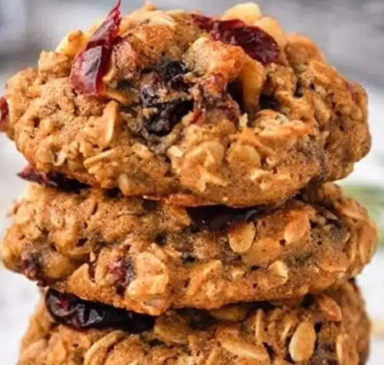 Oatmeal cranberry walnut cookies on a plate, fresh baked and delicious
