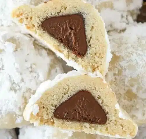 Delicious Snowball Kiss Cookies dusted with powdered sugar